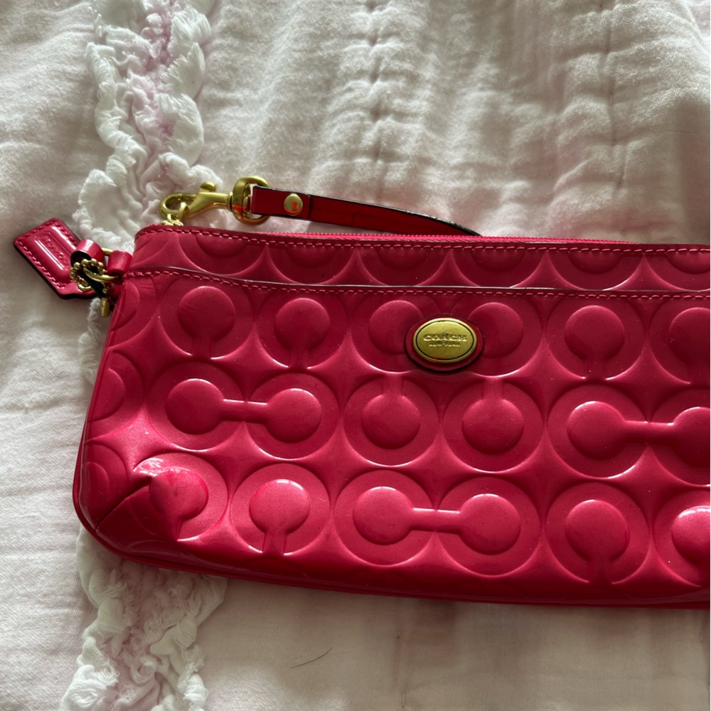 Pink coach wristlet